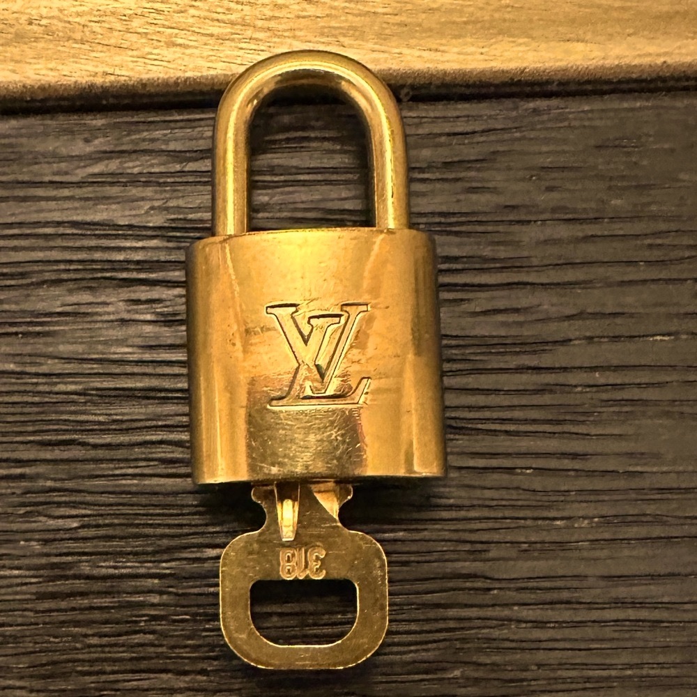 Authentic Louis Vuitton lock and key number 318